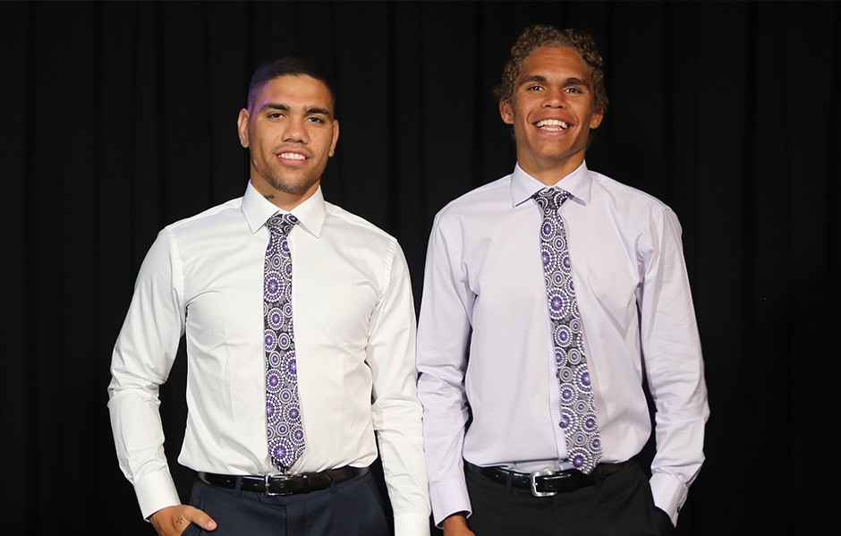henry ties 2712 web.jpg Michael Walters and Liam Henry model the 'Tied to Culture' ties. - Fremantle,Fremantle Dockers